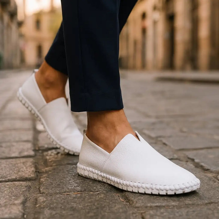 White Dawson men's stitched loafers, worn, side view
