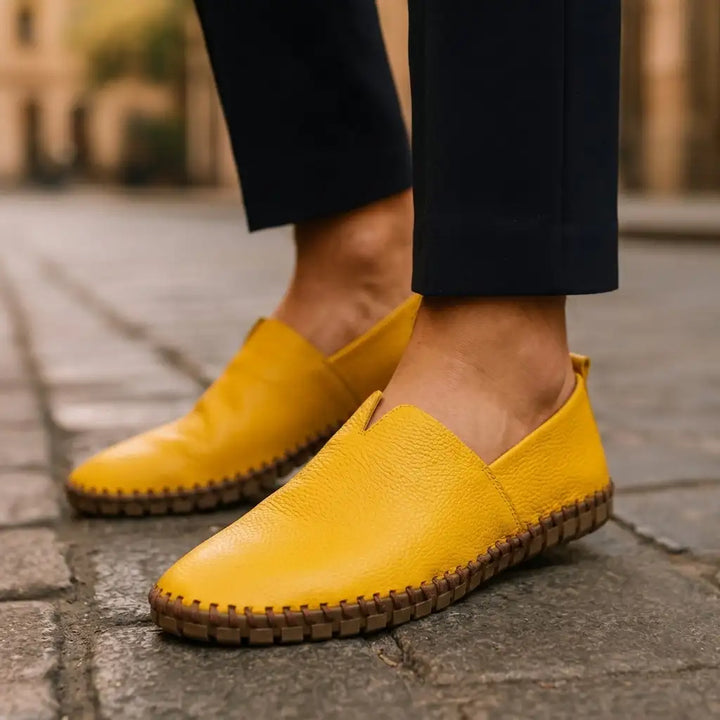 Yellow Dawson men's stitched loafers, worn, side view