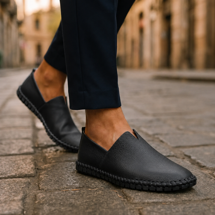 Black Dawson men's stitched loafers, worn, side view
